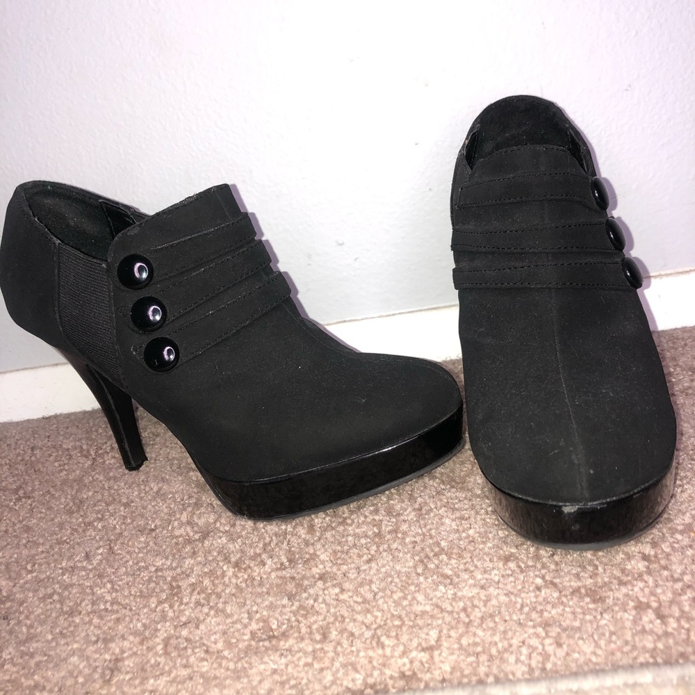 Black closed toes booty heels